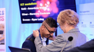 young person receiving medal