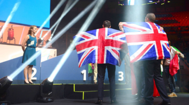 Members of SquadUK holding union jacks in Sao Paulo