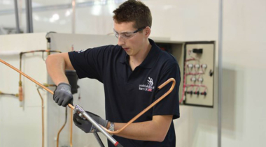 young person competing in plumbing