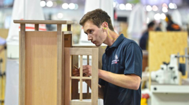 Young person building a cabinet