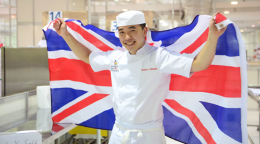 Danny Hoang holding a union jack