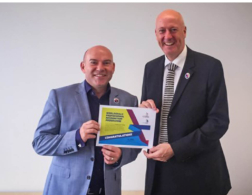 Neil and Nigel holding certificate
