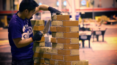 young person bricklaying