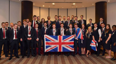 team uk formally dressed with medal and union jack