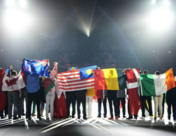 people holding flags from many countries