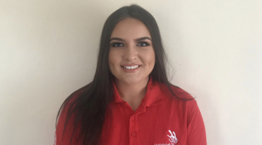 Photo of Chloe, Squad UK Beauty Therapy competitor in her red Squad UK polo shirt