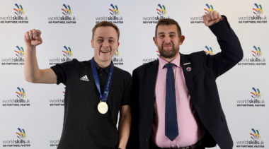 Photo of Dylan, Wall and Floor Tiling competitor celebrating his gold medal