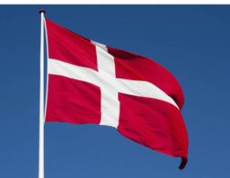 danish flag against blue sky