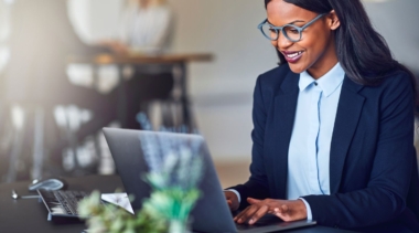 Photo of accountant typing into a computer