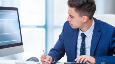 Photo of accountant looking at computer screen