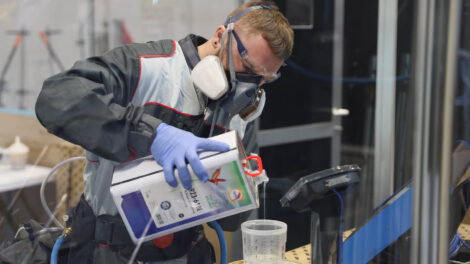 Young person competing in Automotive Body Refinishing competition