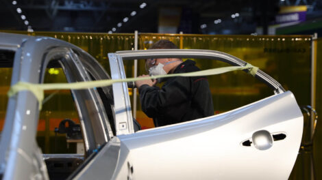 Young person competing in Automotive Body Refinishing competition