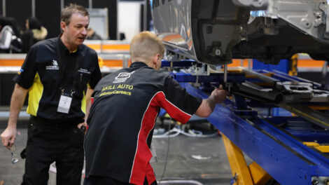 Young person competing in Automotive Body Refinishing competition