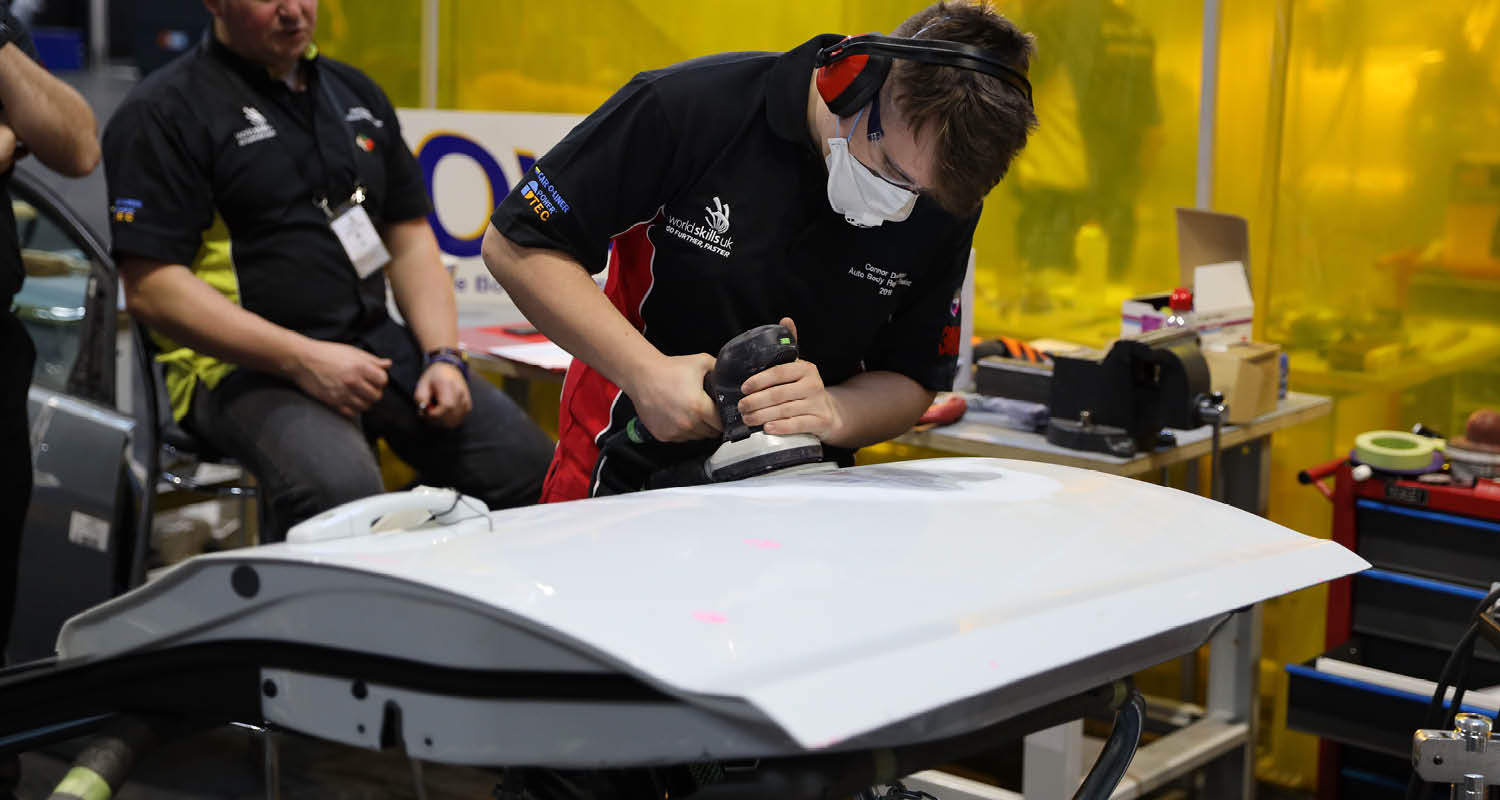 Young person competing in Automotive Body Refinishing competition