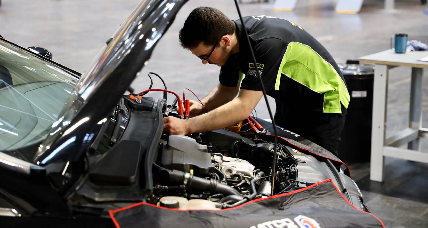 Young person competing in Automotive Technology competition