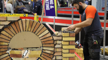 Young person competing in Bricklaying competition