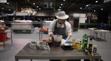 Young person competing in Butchery competition