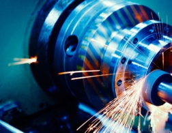 Photo of a CNC milling machine with sparks