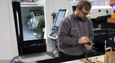 Young person competing in CNC Turning competition
