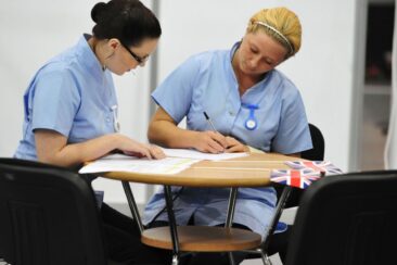 Photo of competitors Frances McMenemy and Emma Fitzpatrick in Caring WorldSkills London 2011