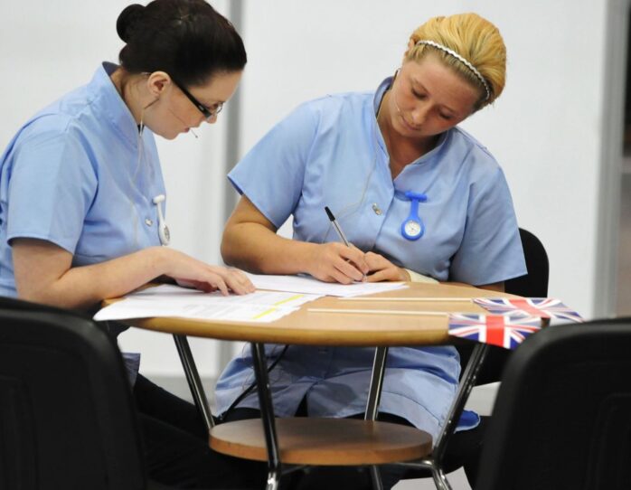 Photo of competitors Frances McMenemy and Emma Fitzpatrick in Caring WorldSkills London 2011
