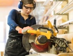 Photo of a carpenter using a circular saw