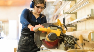 Photo of a carpenter using a circular saw