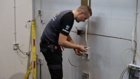 Young person competing in Electrical Installation competition