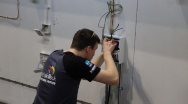 Young person competing in Electrical Installation competition