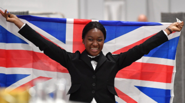 Photo of Restaurant Service competitor Elizabeth celebrating with the Union Jack