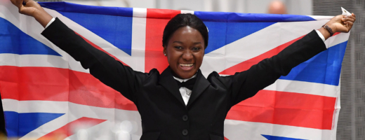 Photo of Restaurant Service competitor Elizabeth celebrating with the Union Jack