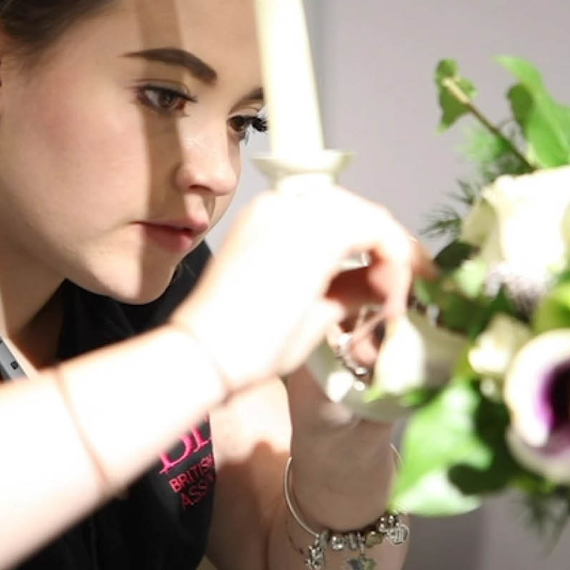 Young person competing in Floristry competition