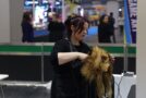 Young person competing in Hairdressing competition