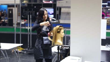 Young person competing in Hairdressing competition