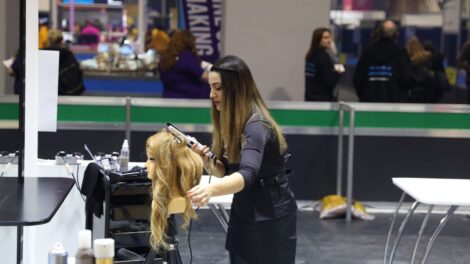 Young person competing in Hairdressing competition