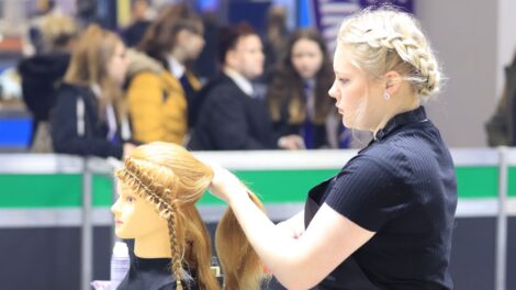 Young person competing in Hairdressing competition