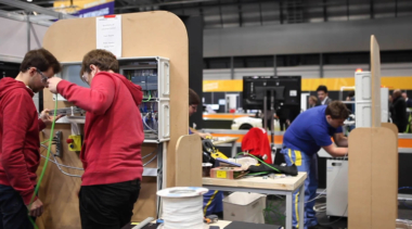 Young people competing in Industrial Control competition