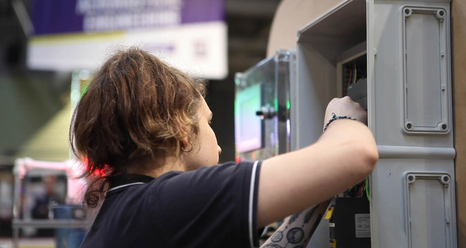 Young person competing in Industrial Control competition