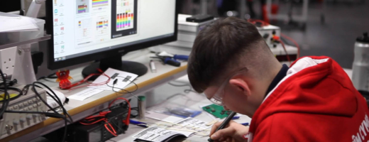 Young person competing in Industrial Electronics competition