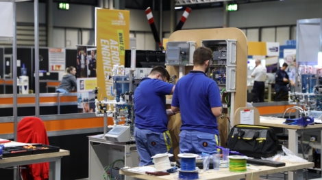 Young people competing in Industrial Control competition
