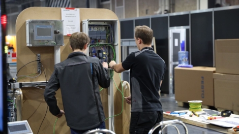 Young people competing in Industrial Control competition