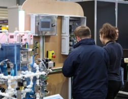 Young people competing in Industrial Control competition