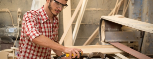 Photo of joiner sanding piece of wood