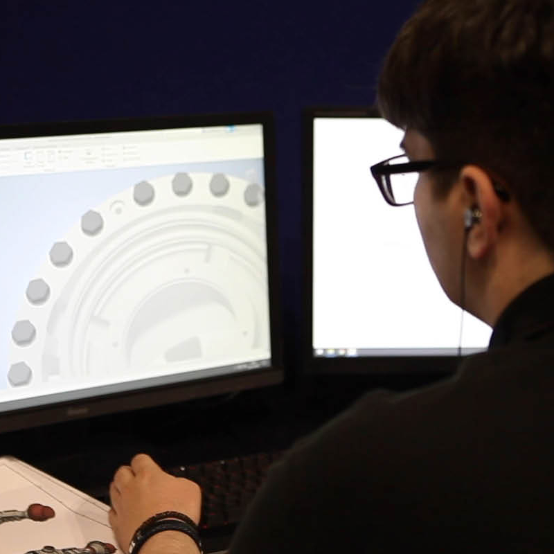 Young person competing in Mechanical Engineering CAD competition