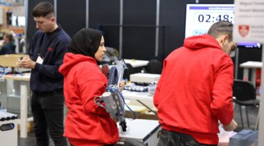 Young people competing in Mechatronics competition