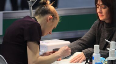 Young person competing in Nail Technician competition