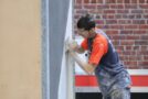 Young person competing in Plastering and Drywall Systems competition