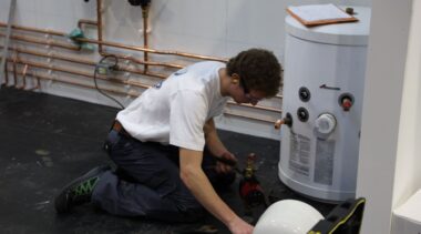 Young person competing in Plumbing competition