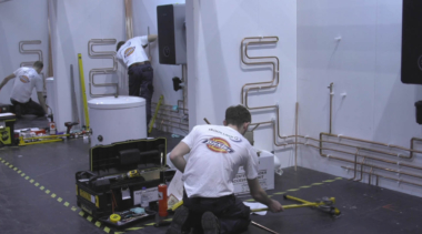 Young people competing in Plumbing competition