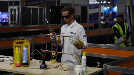 Young person competing in Refrigeration competition